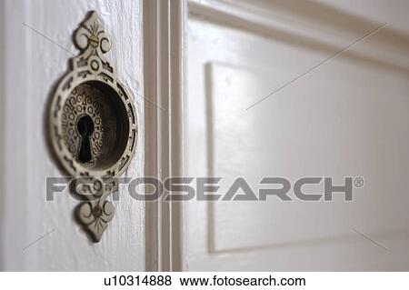 Stock Photo - Keyhole at a door. Fotosearch