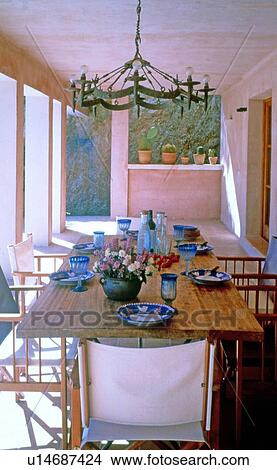 Picture - Laid table on loggia. Fotosearch
