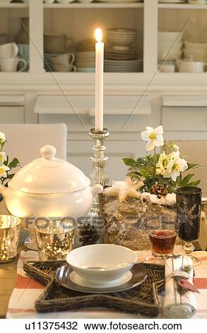 Stock Image - Laid table with candle. Fotosearch