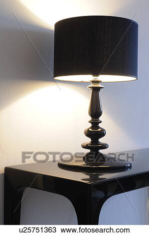 Lamp on a stool View Large Photo Image Stock Image - Lamp on a stool. Fotosearch