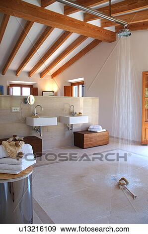 Stock Photo - Large room with washbasins at a partition wall. Fotosearch