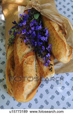 Stock Photo - Lavender blossoms and baguette. Fotosearch