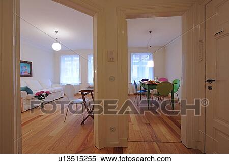 Living room and dining room in an apartment View Large Photo Image Stock Photography - Living room and dining room in an apartment. Fotosearch