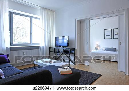 Living room with view into bedroom View Large Photo Image Stock Image - Living room with view into bedroom. Fotosearch