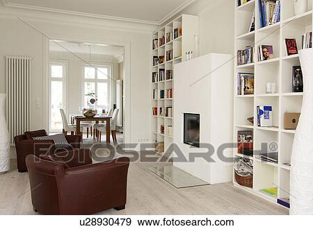 Stock Photo - Living room with view into dining room. Fotosearch
