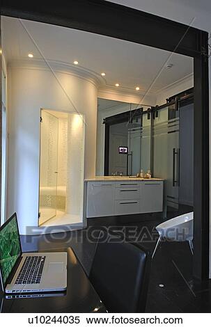 Modern bathroom with passage to working area View Large Photo Image Stock Photography - Modern bathroom with passage to working area. Fotosearch