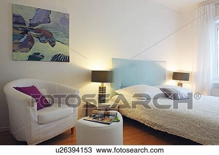 Modern bedroom with painting at the wall View Large Photo Image Stock Image - Modern bedroom with painting at the wall. Fotosearch