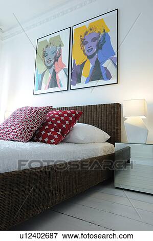 Modern bedroom with pop art above the bed View Large Photo Image Stock Photo - Modern bedroom with pop art above the bed. Fotosearch