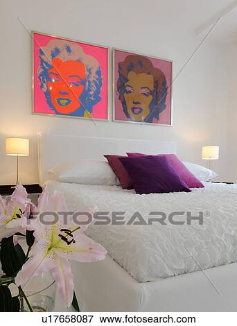 Modern bedroom with pop art above the bed View Large Photo Image Stock Photo - Modern bedroom with pop art above the bed. Fotosearch