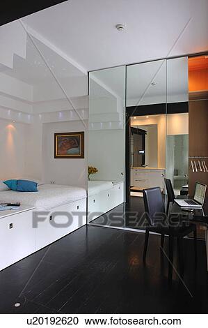 Modern bedroom with working area View Large Photo Image Stock Image - Modern bedroom with working area. Fotosearch