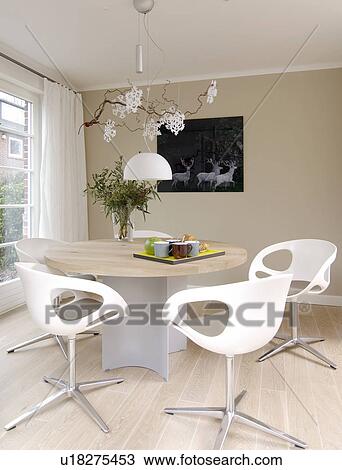 Modern bright dining room with round table and chairs View Large Photo Image Stock Image - Modern bright dining room with round table and chairs. Fotosearch