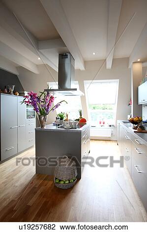 Modern kitchen with kitchen island View Large Photo Image Stock Image - Modern kitchen with kitchen island. Fotosearch