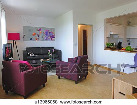 Modern living room with open plan kitchen View Large Photo Image Stock Photo - Modern living room with open plan kitchen. Fotosearch