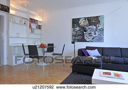Modern living room with painting and dining area View Large Photo Image Stock Image - Modern living room with painting and dining area. Fotosearch