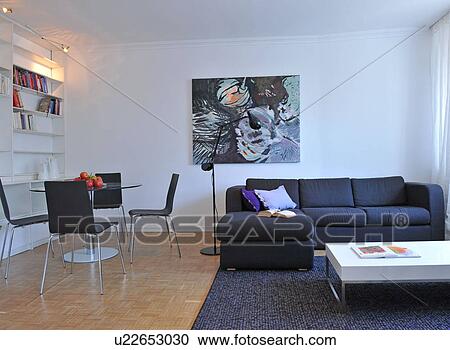 Modern living room with painting and dining area View Large Photo Image Stock Image - Modern living room with painting and dining area. Fotosearch