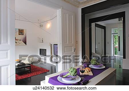 Modern open plan kitchen with passage to living room View Large Photo Image Stock Image - Modern open plan kitchen with passage to living room. Fotosearch