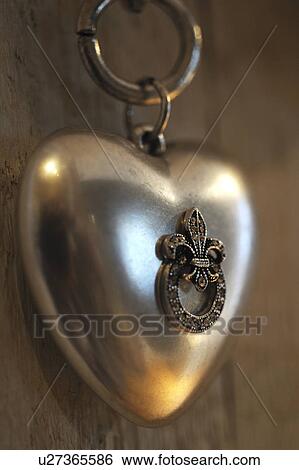Necklace with heart-shaped pendant View Large Photo Image Stock Photograph - Necklace with heart-shaped pendant. Fotosearch