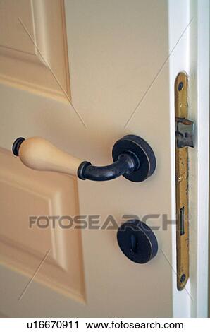 Stock Image - Old-fashioned door handle. Fotosearch