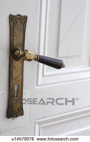 Old-fashioned door handle View Large Photo Image Stock Photo - Old-fashioned door handle. Fotosearch