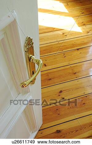 Stock Photo - Open door and wooden floor. Fotosearch