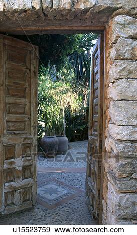 Stock Photo - Open door towards garden. Fotosearch