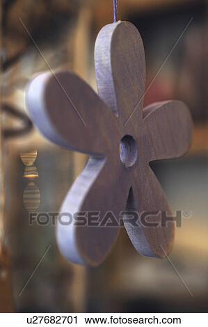 Stock Image - Ornate flower made of wood. Fotosearch