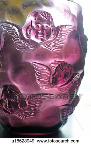 Ornate glass with angel figurines View Large Photo Image Stock Photo - Ornate glass with angel figurines. Fotosearch