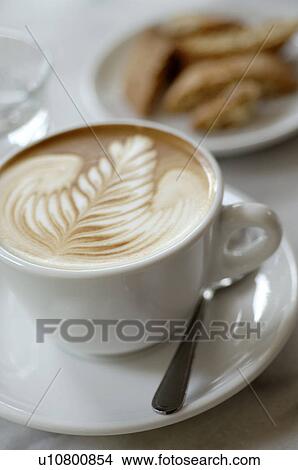 Picture - Ornate milk froth on a cappuccino. Fotosearch