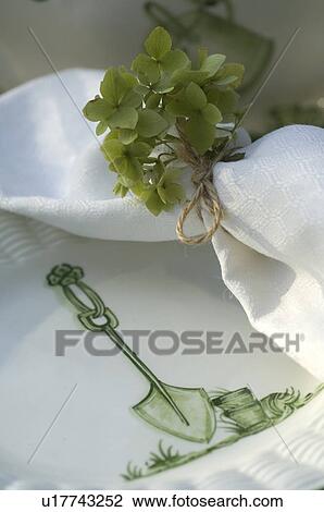 Stock Image - Ornate plate and napkin. Fotosearch