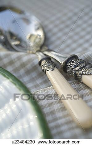 Stock Image - Ornate spoons. Fotosearch