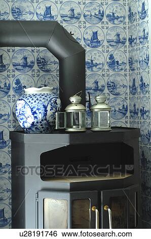 Oven in front of tiled wall View Large Photo Image Stock Photograph - Oven in front of tiled wall. Fotosearch
