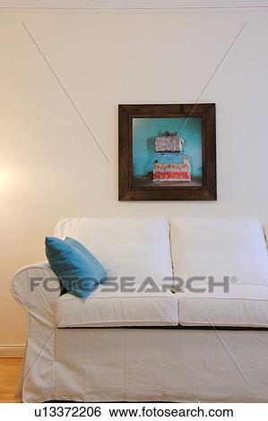 Painting above couch in living room View Large Photo Image Stock Photograph - Painting above couch in living room. Fotosearch