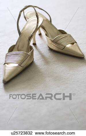 Stock Image - Pair of ladies shoes. Fotosearch