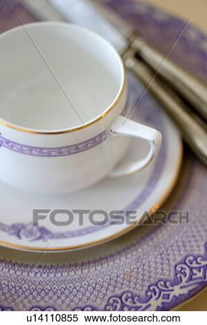 Place setting with cup, saucer, plate and cutlery View Large Photo Image Stock Photography - Place setting with cup, saucer, plate and cutlery. Fotosearch