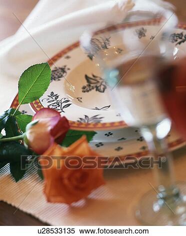 Place setting with wine and rose View Large Photo Image Stock Photography - Place setting with wine and rose. Fotosearch