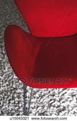 Red armchair on rug View Large Photo Image Stock Image - Red armchair on rug. Fotosearch