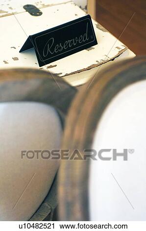 Reserved sign on table View Large Photo Image Stock Image - Reserved sign on table. Fotosearch