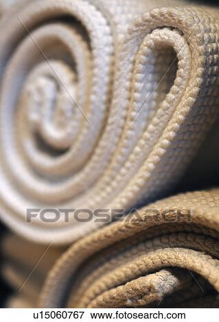 Stock Photo - Rolled up carpets. Fotosearch