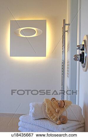 Stock Photo - Room with wall light. Fotosearch