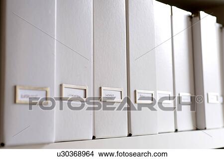 Picture - Row of white folders. Fotosearch