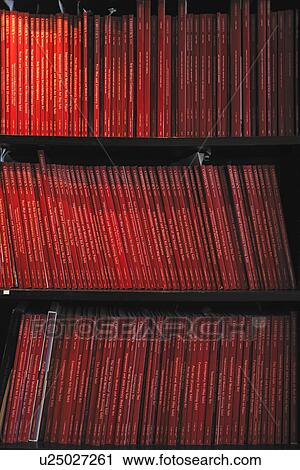 Stock Image - Rows of red books. Fotosearch