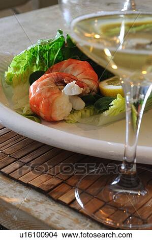 Salad with shrimps and glass of white wine View Large Photo Image Picture - Salad with shrimps and glass of white wine. Fotosearch