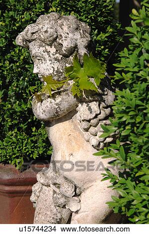 Picture - Sculpture in garden. Fotosearch
