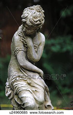 Stock Photography - Sculpture in garden. Fotosearch