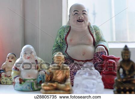 Stock Photography - Several Asian figurines. Fotosearch