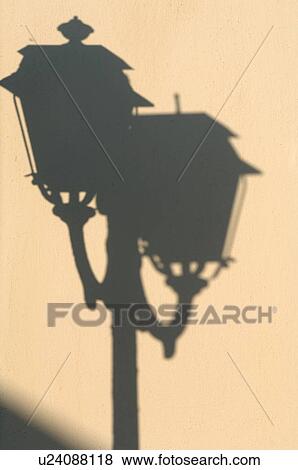 Shadow of a street lamp View Large Photo Image Stock Photo - Shadow of a street lamp. Fotosearch