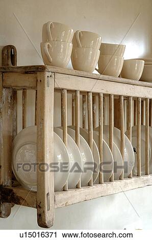 Shelf with plates and cups View Large Photo Image Stock Image - Shelf with plates and cups. Fotosearch