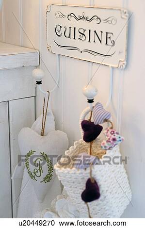 Sign and sachets on hooks in kitchen View Large Photo Image Stock Image - Sign and sachets on hooks in kitchen. Fotosearch