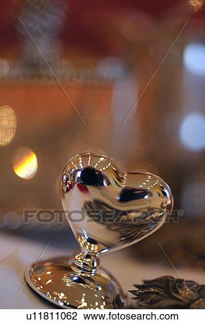 Stock Image - Silver decorative heart. Fotosearch