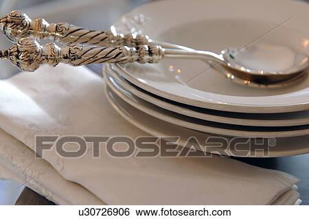 Silver spoons and soup plates View Large Photo Image Stock Photograph - Silver spoons and soup plates. Fotosearch